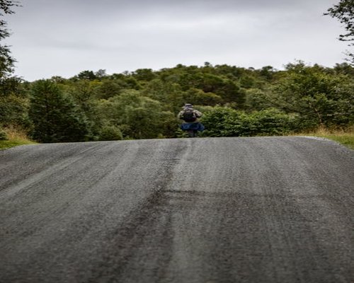 Active person walking in nature field